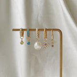 Aurelia Spiral 18K Gold Huggie Earrings